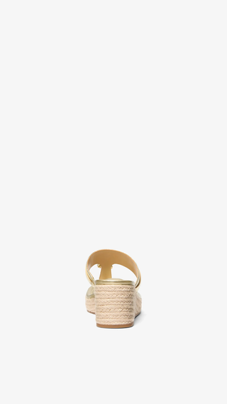 Tacones Michael Kors Zoe wedge Dorado