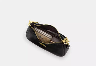 Cartera Coach Teri in Signature Canvas pebbled leather/Gold/Black